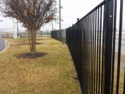 Powder-coated steel fence. Measured, fabricated, and installed by our field crew in Spartanburg, SC.